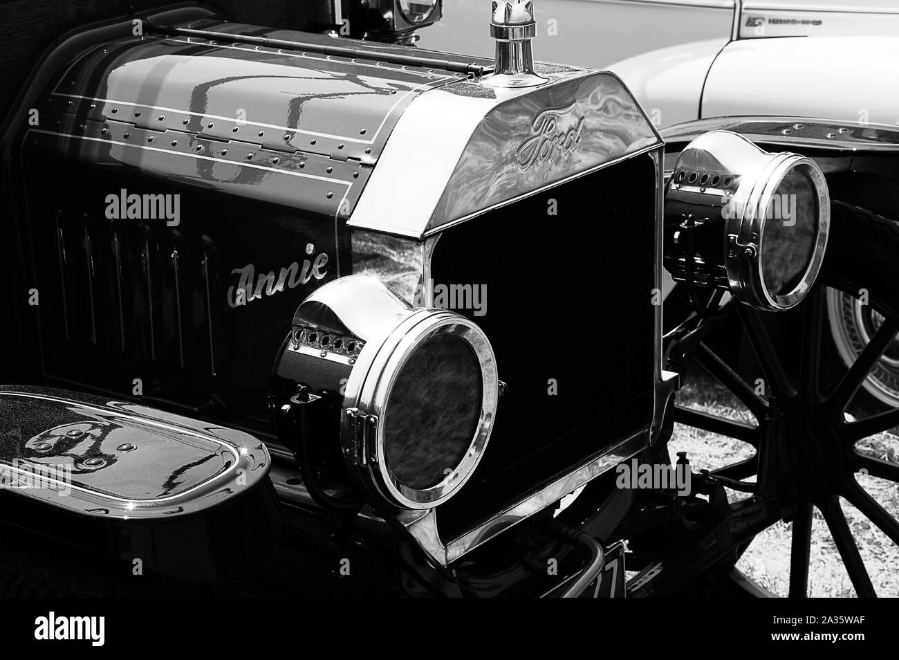 The front of a red Ford Model T on display at a car show Stock Photo