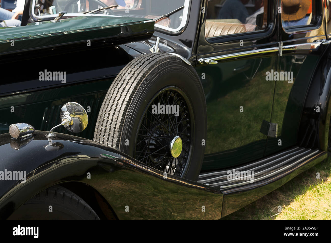 The side of a green 1940's Alvis roadster Stock Photo