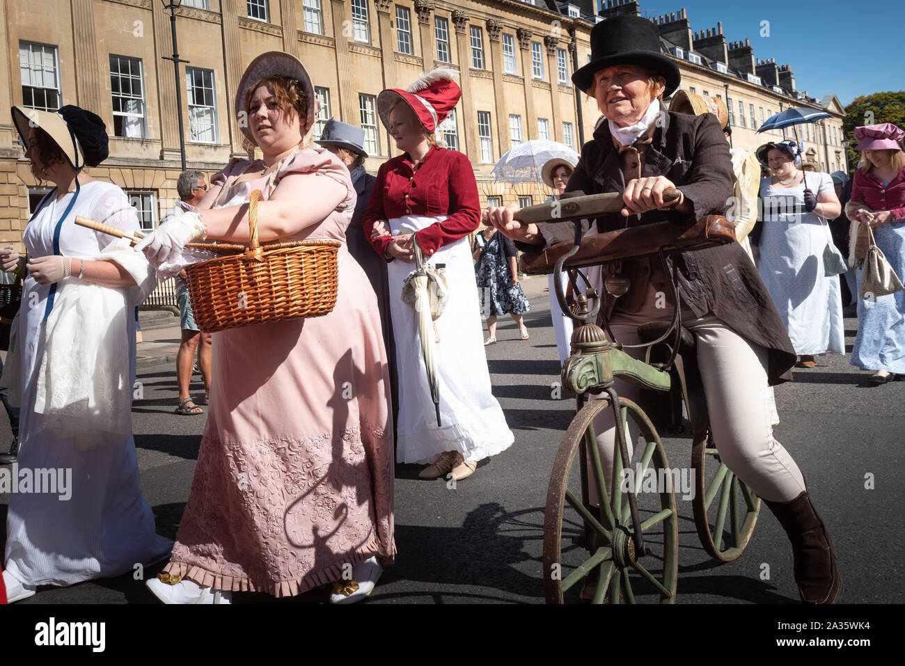 Bath, Somerset, UK. 14th September 2019. Several hundred Jane Austen fans dressed in period attire take part in the Grand Regency Costumed Promenade c Stock Photo
