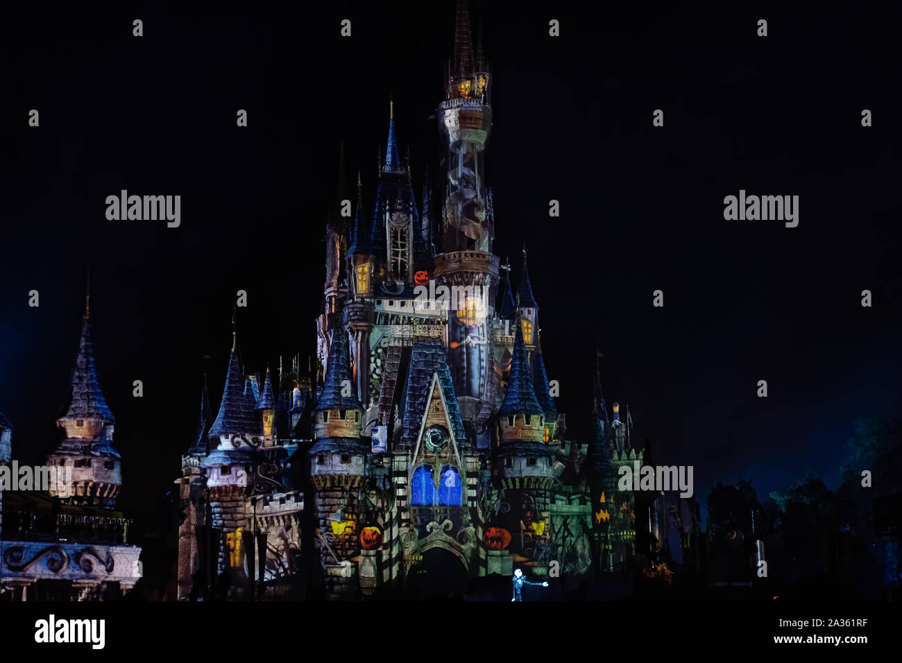 Night Colour Projections On Cinderella Castle From The Halloween Party At Disney Stock Photo Alamy