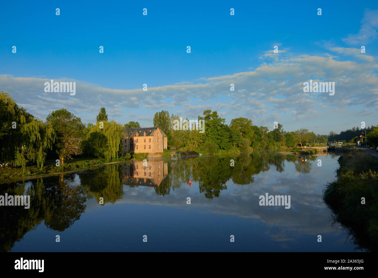 Image of the River Vilaine at Pont-Rean, Brittiany, France with lock in the back ground, France Stock Photo