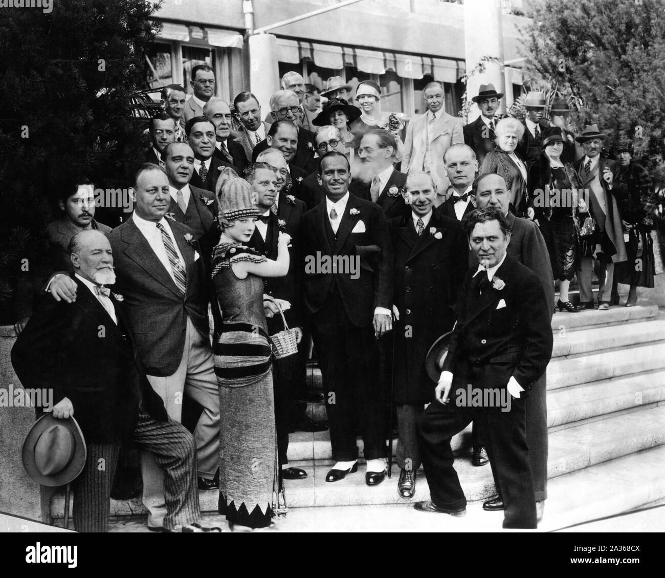 MAX REINHARDT reception with JOSEF von STERNBERG EMIL JANNINGS DOUGLAS FAIRBANKS LOUIS B. MAYER MARCUS LOEW JOSEPH SCHENCK and MORRIS GEST at Ambassador Hotel Los Angeles California 1927 prior to presenting his theatrical production THE MIRACLE Stock Photo