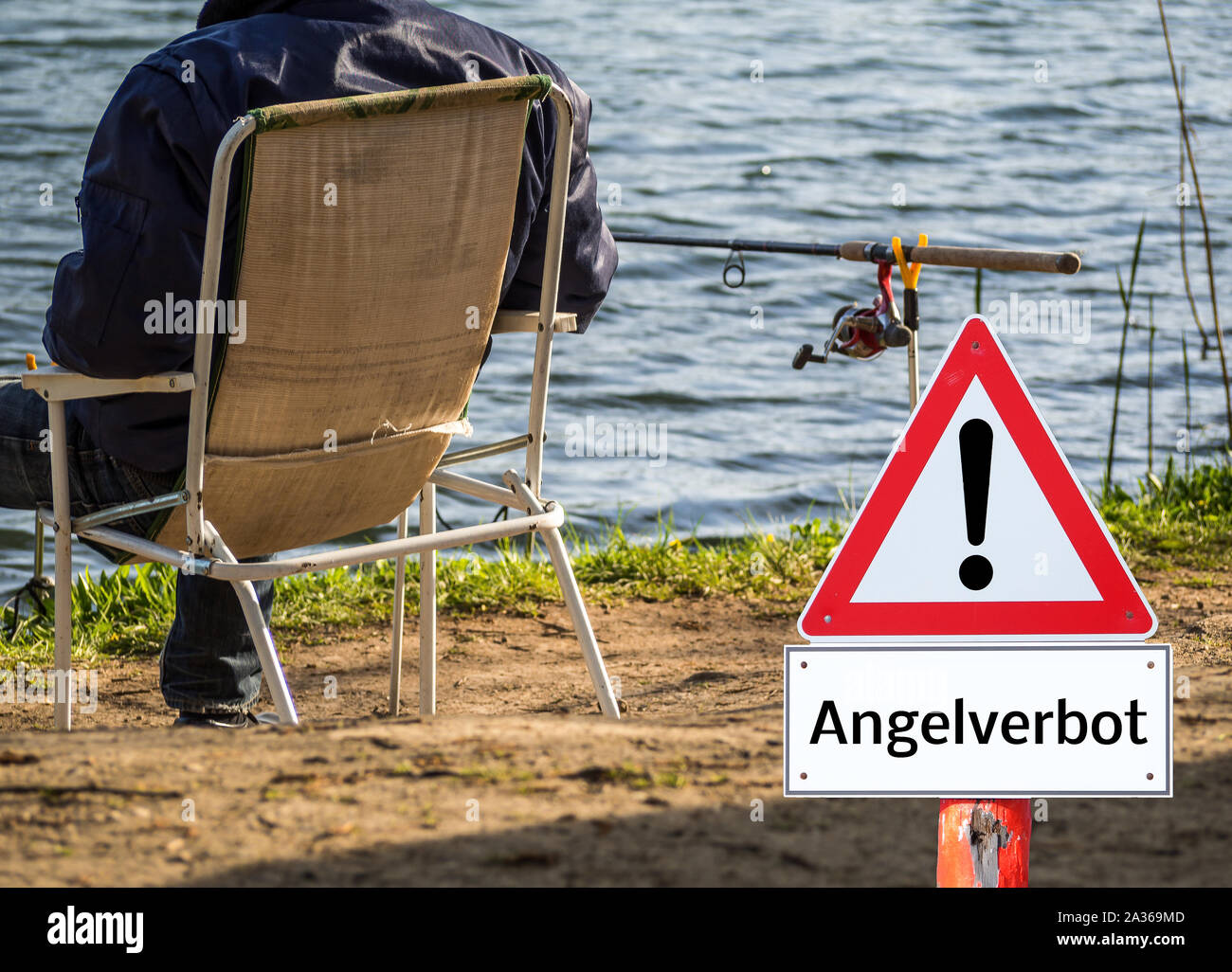 Warning sign Fishing ban Angler Stock Photo