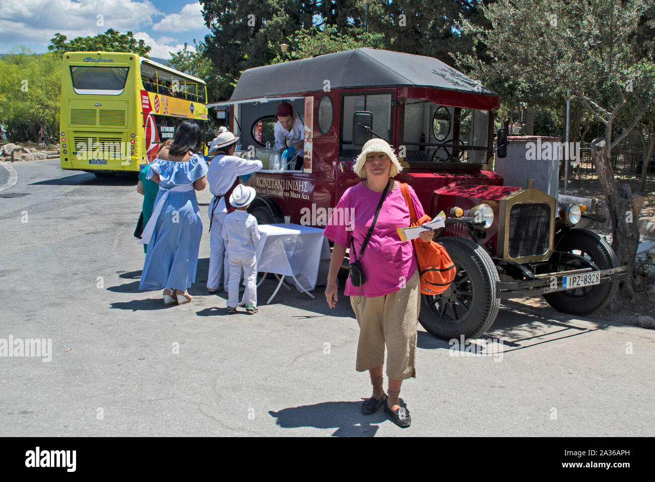 Athens, Greece, June 04.2016. An ice cream truck from which tourists at the foothills of the Acropolis in Athens are supplied with real ice-cream trea Stock Photo