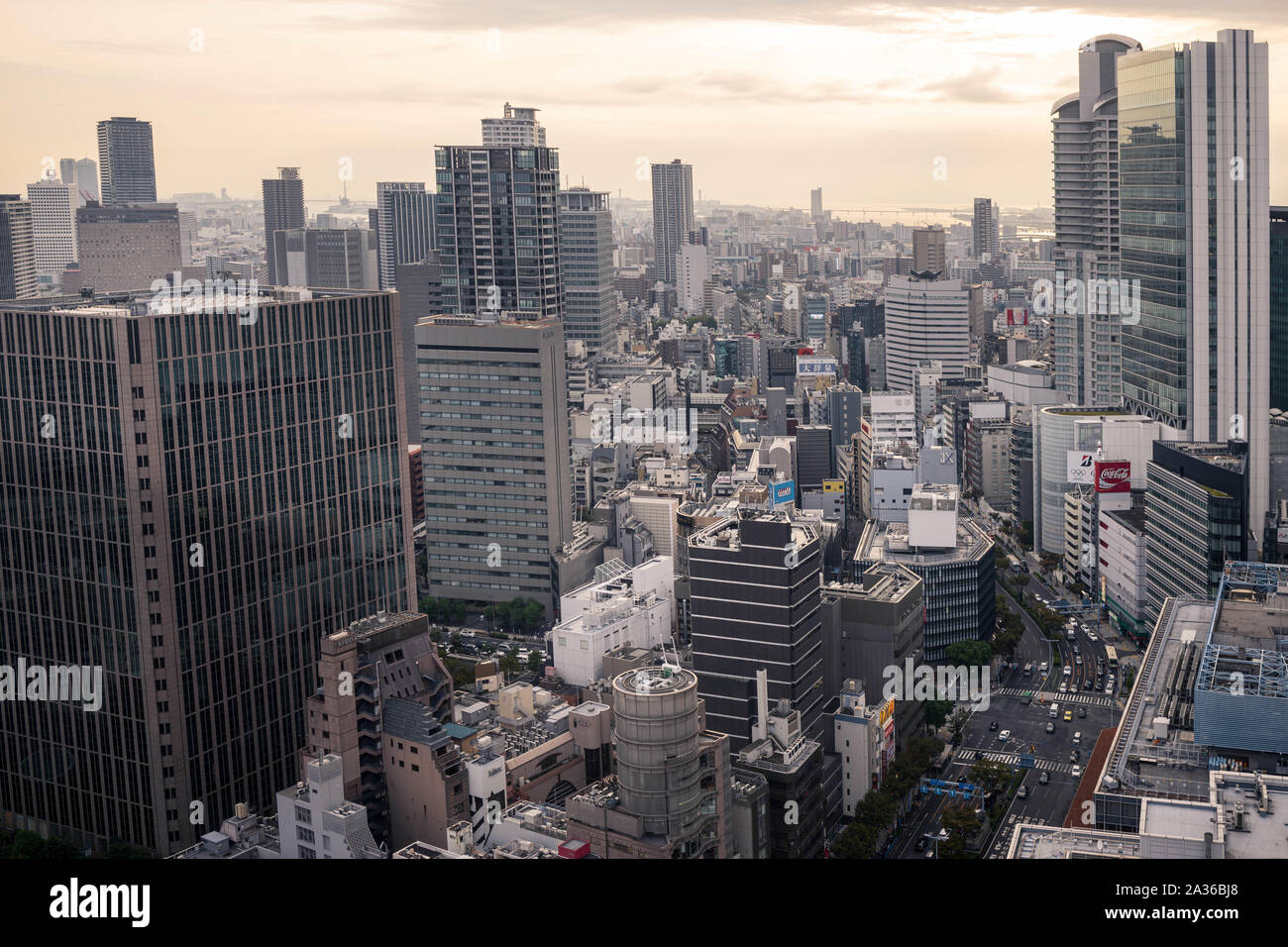 Osaka, Japan - September 22, 2019: Orange sunset over business towers and sprawling downtown Umeda district Stock Photo