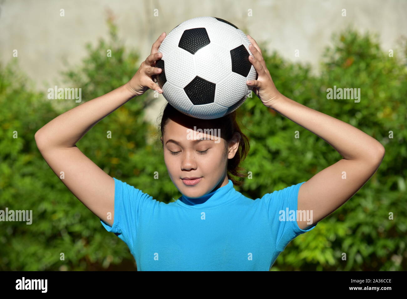 A Beautiful Soccer Player With Soccer Ball Stock Photo