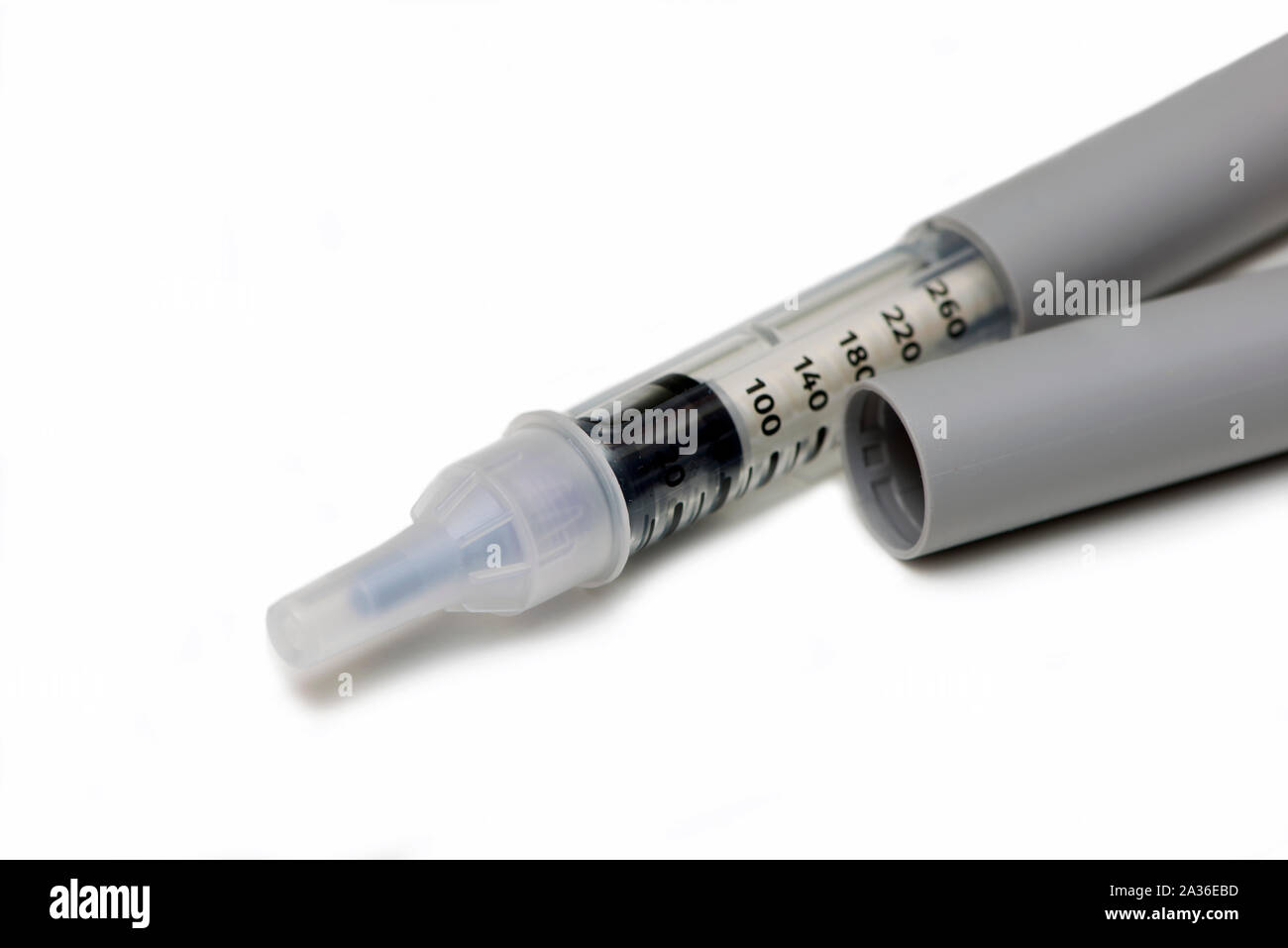Close up of insulin pen on white background. Stock Photo