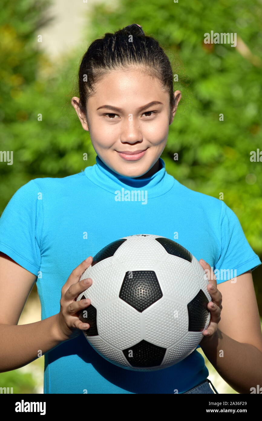 Female Soccer Player Portrait With Soccer Ball Stock Photo