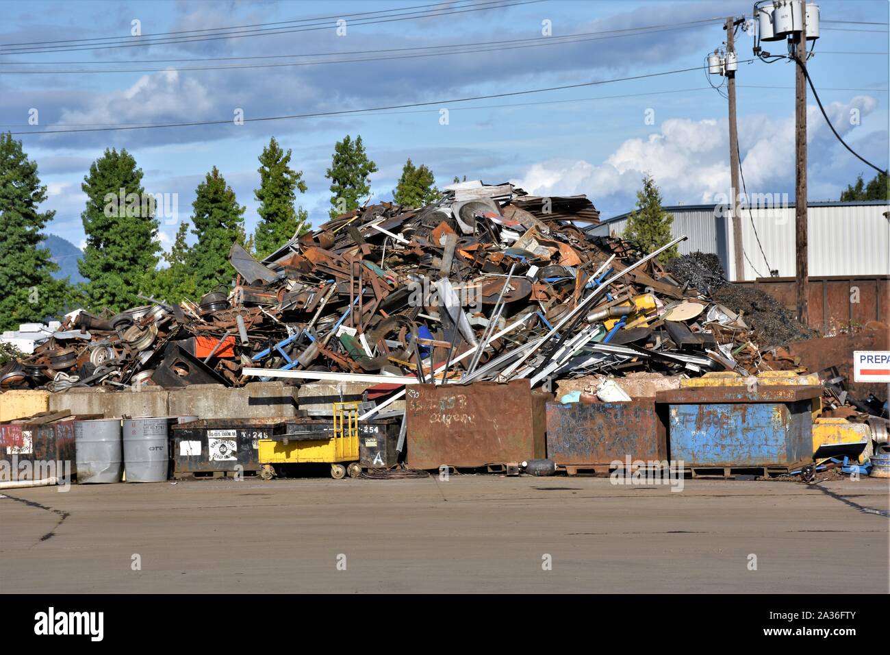 Steel and other metals being stacked for reuse and salvage and sale due ...