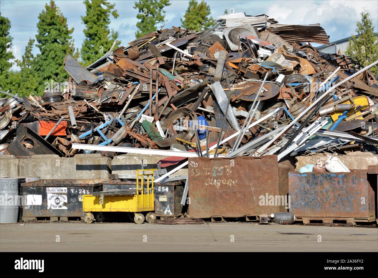 Steel and other metals being stacked for reuse and salvage and sale due ...