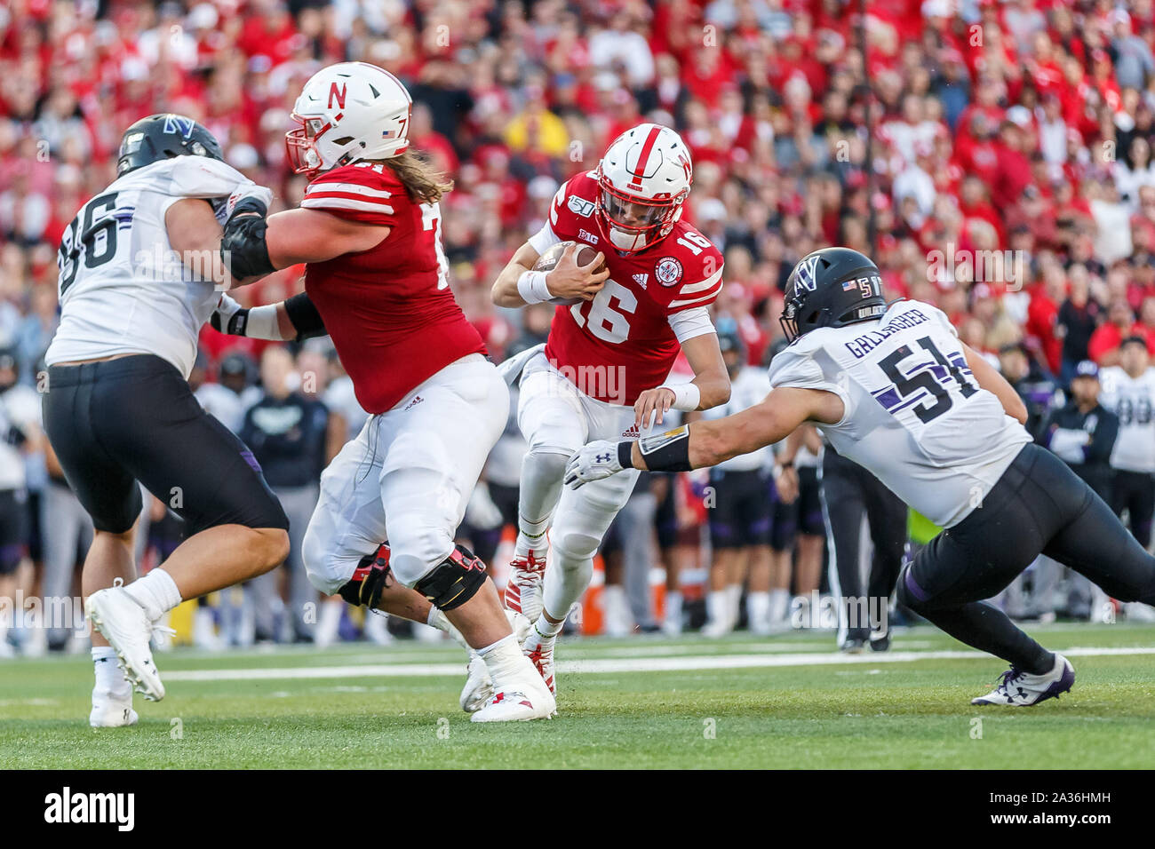 Lincoln, NE. U.S. 05th Oct, 2019. Nebraska Cornhuskers quarterback Noah Vedral #16 rushes late in the 4th quarter to set up the winning field goal in action during a NCAA Division 1 football game between Northwestern Wildcats and the Nebraska Cornhuskers at Memorial Stadium in Lincoln, NE. Attendance: 89,384.Nebraska won 13-10.Michael Spomer/Cal Sport Media/Alamy Live News Stock Photo