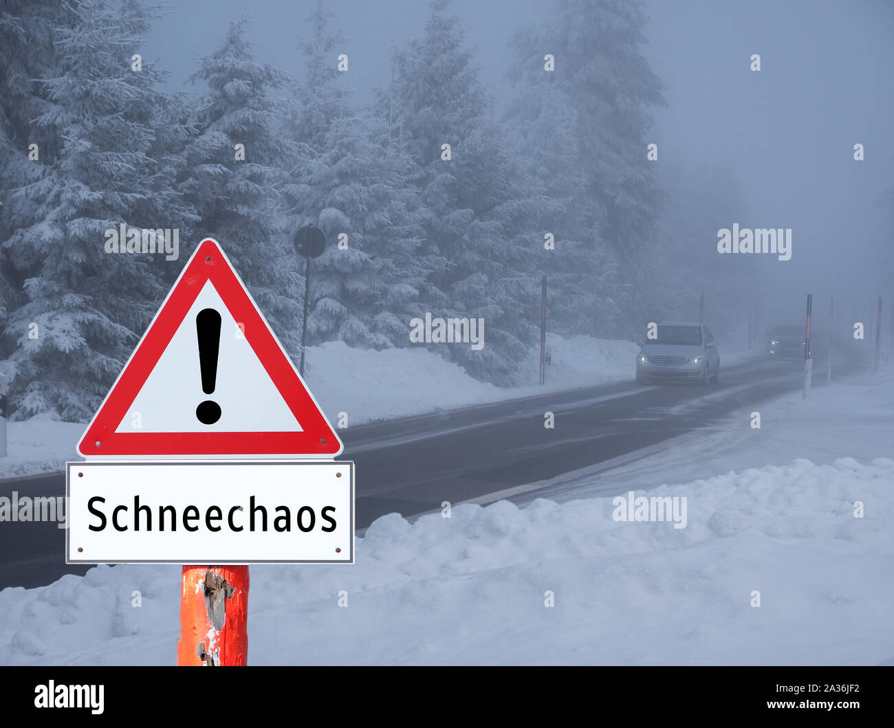 Snow chaos warning sign Stock Photo