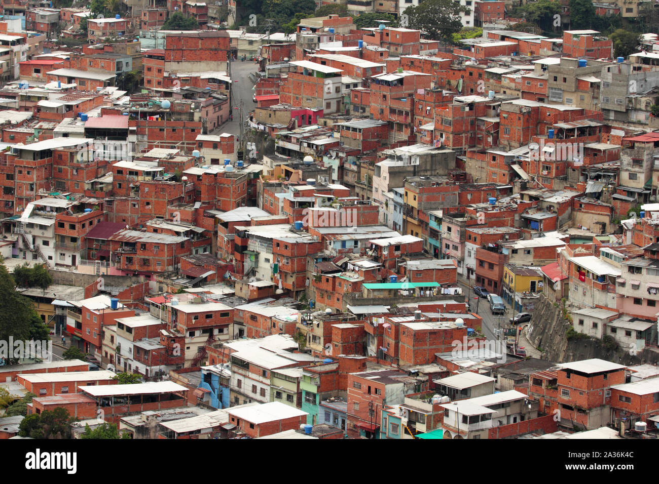 Simple houses or ranchos in Caracas, Venezuela. Ranchos are the forms of informal poor housing that cover the hills surrounding the city Stock Photo