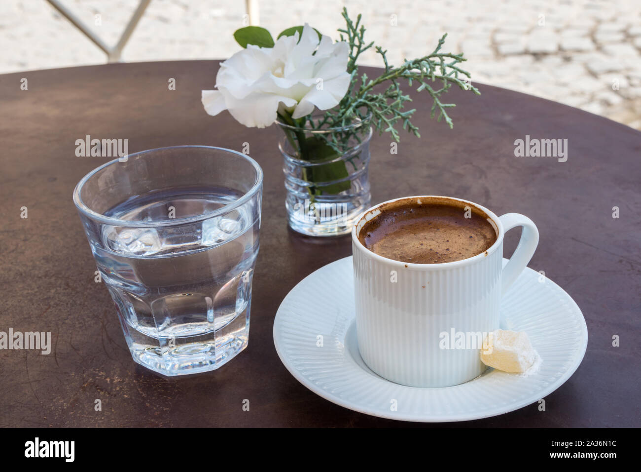 Turkish coffee with Turkish delight and a glass of water Stock Photo