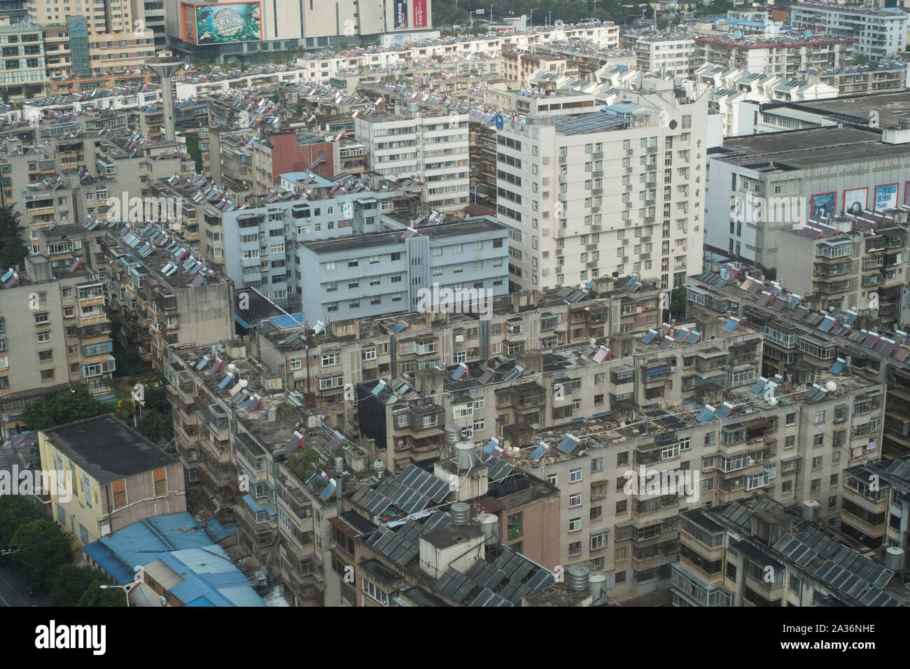 Solar Water Heaters on the top of the buildings in Kunming, Yunnan, China. Stock Photo