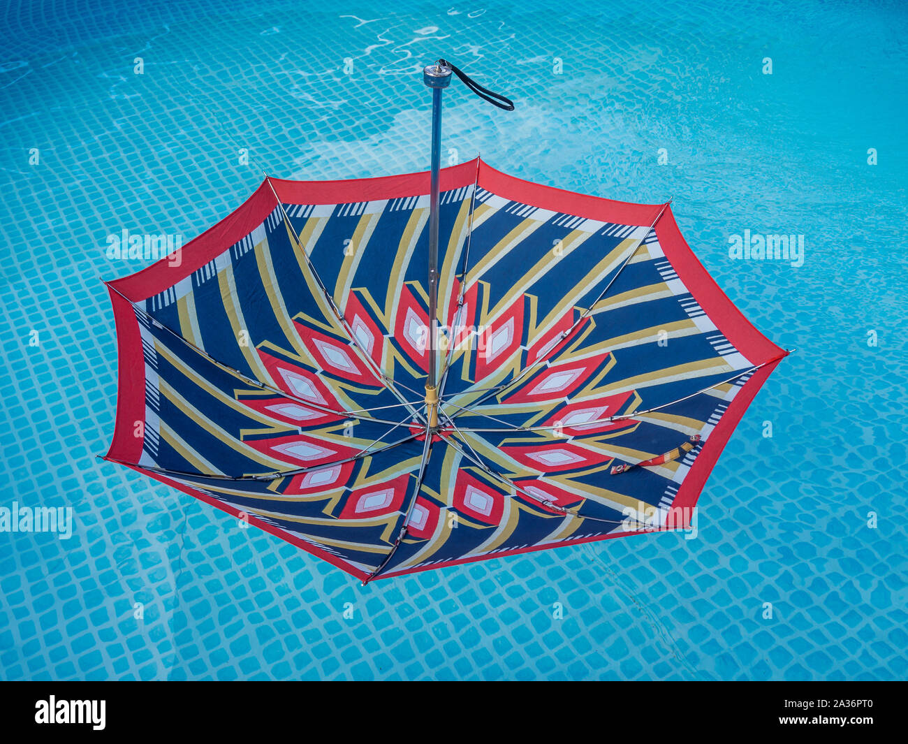 Umbrella in the water Stock Photo - Alamy