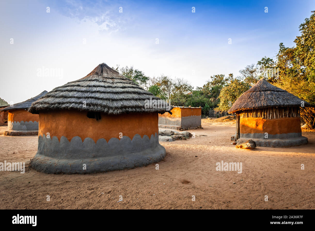 Local village with traditional zimbabwian huts from clay and hay. Matobo, Matabeleland province, Zimbabwe, Africa Stock Photo