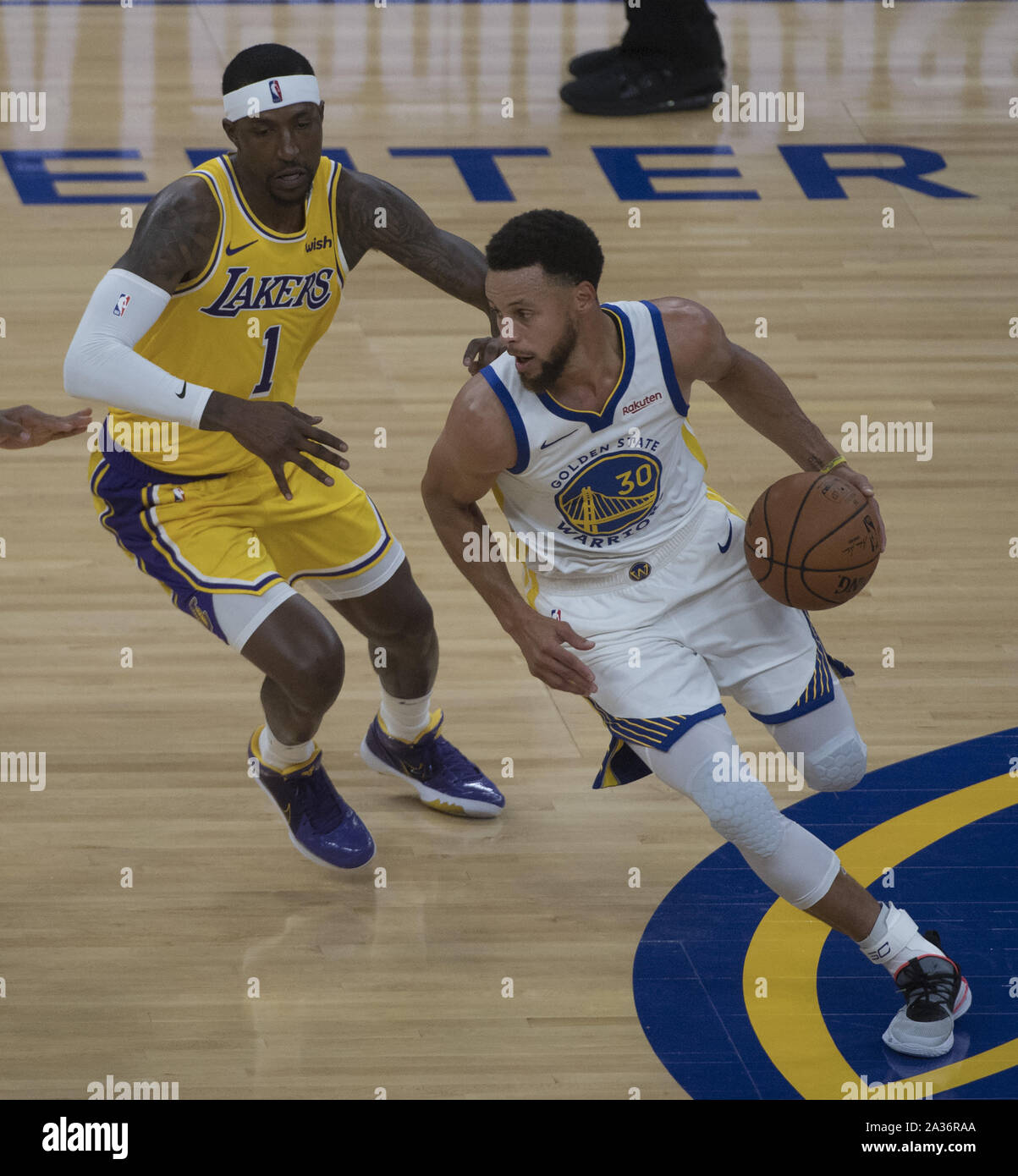 San Francisco, United States. 06th Oct, 2019. Golden State Warriors guard Stephen Curry (30) dribbles around Los Angeles Lakers guard Kentavious Caldwell-Pope (1) at the Chase Center in San Francisco on October 5, 2019. The Chase Center is the new home of the Warriors. Photo by Terry Schmitt/UPI Credit: UPI/Alamy Live News Stock Photo