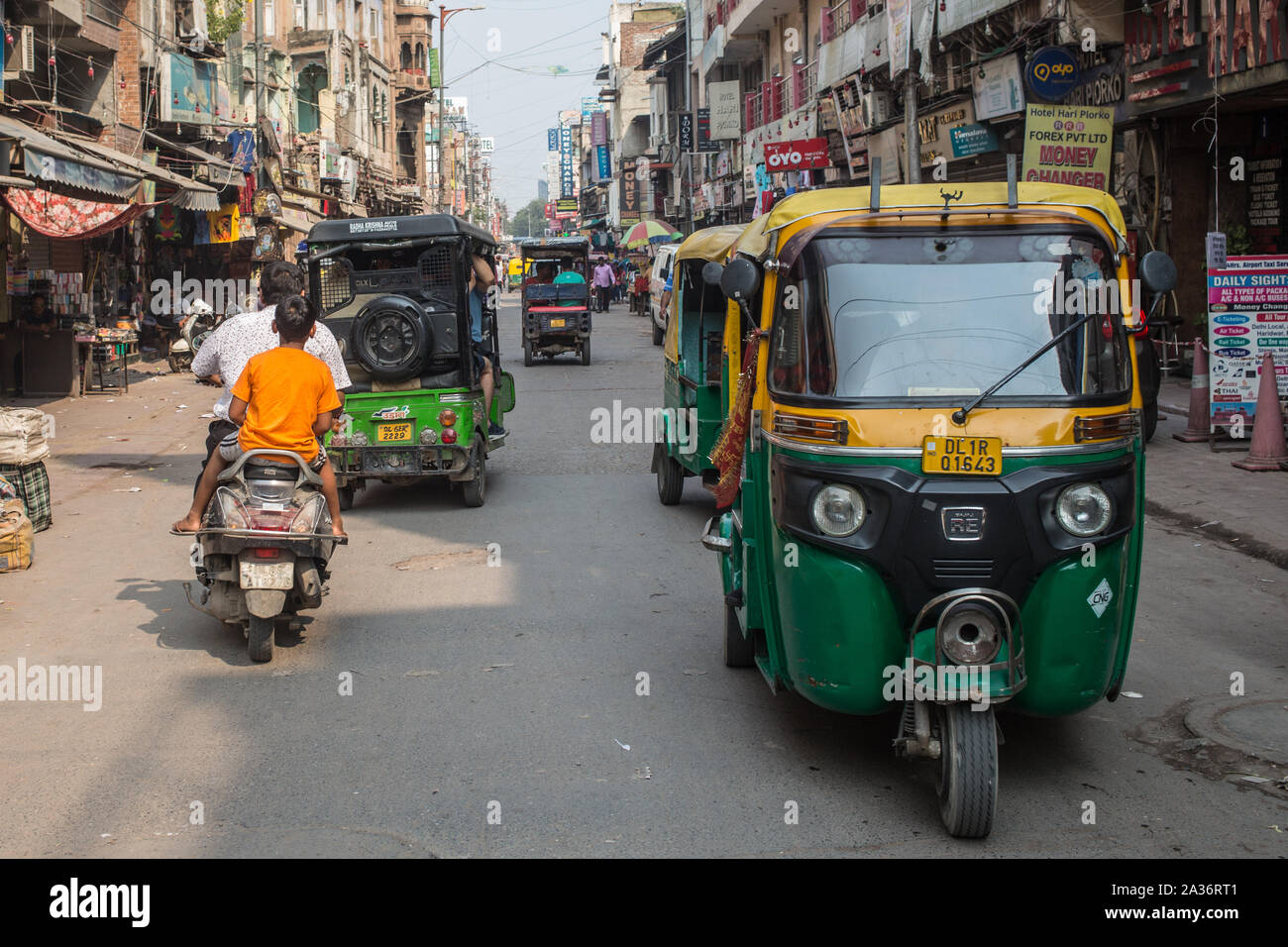 A view of rickshaws on a road in downtown New Delhi. Stock Photo