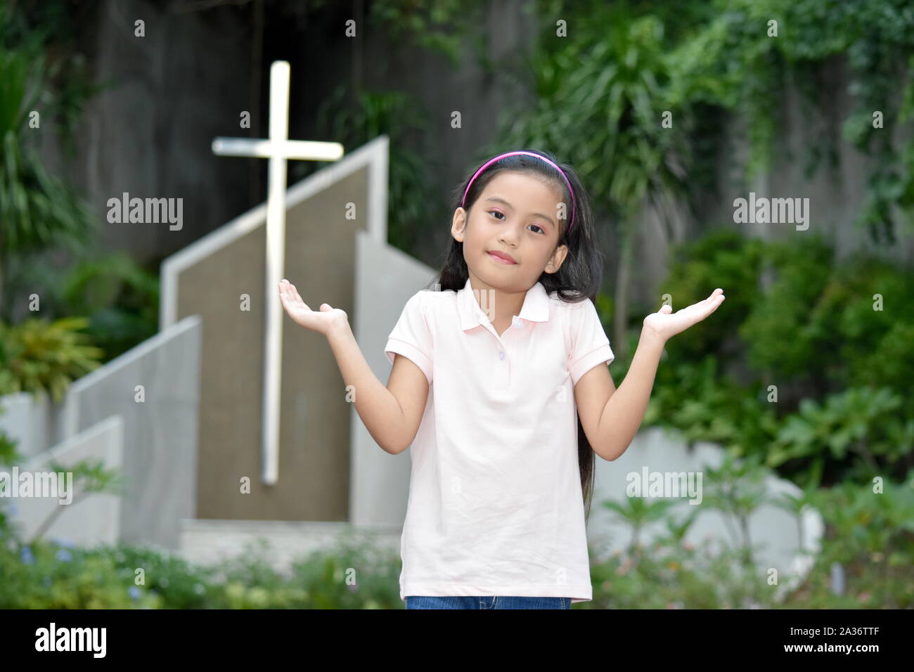 Preteen Making A Decision And Cross Stock Photo