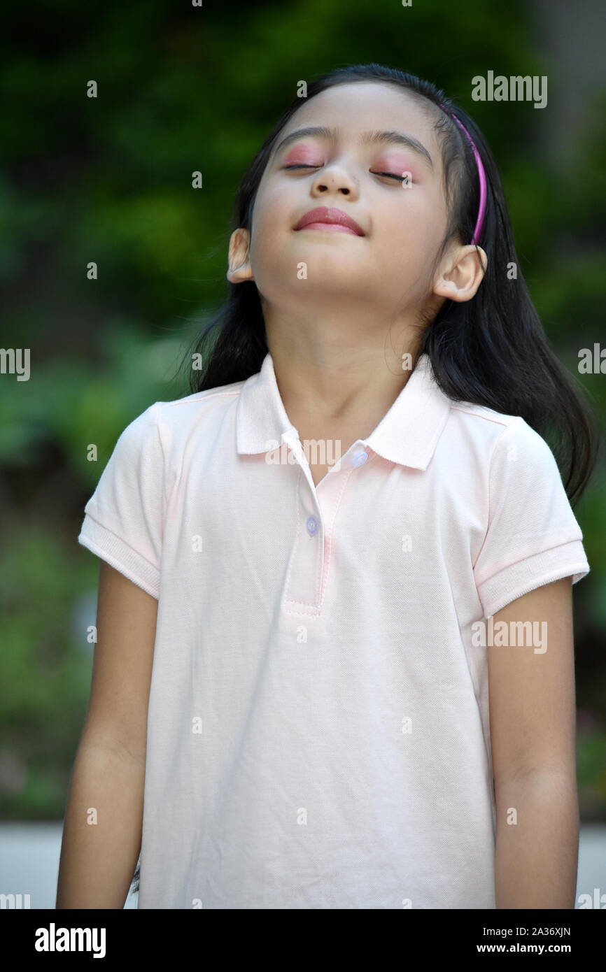 An A Contemplative Girl Child Stock Photo - Alamy