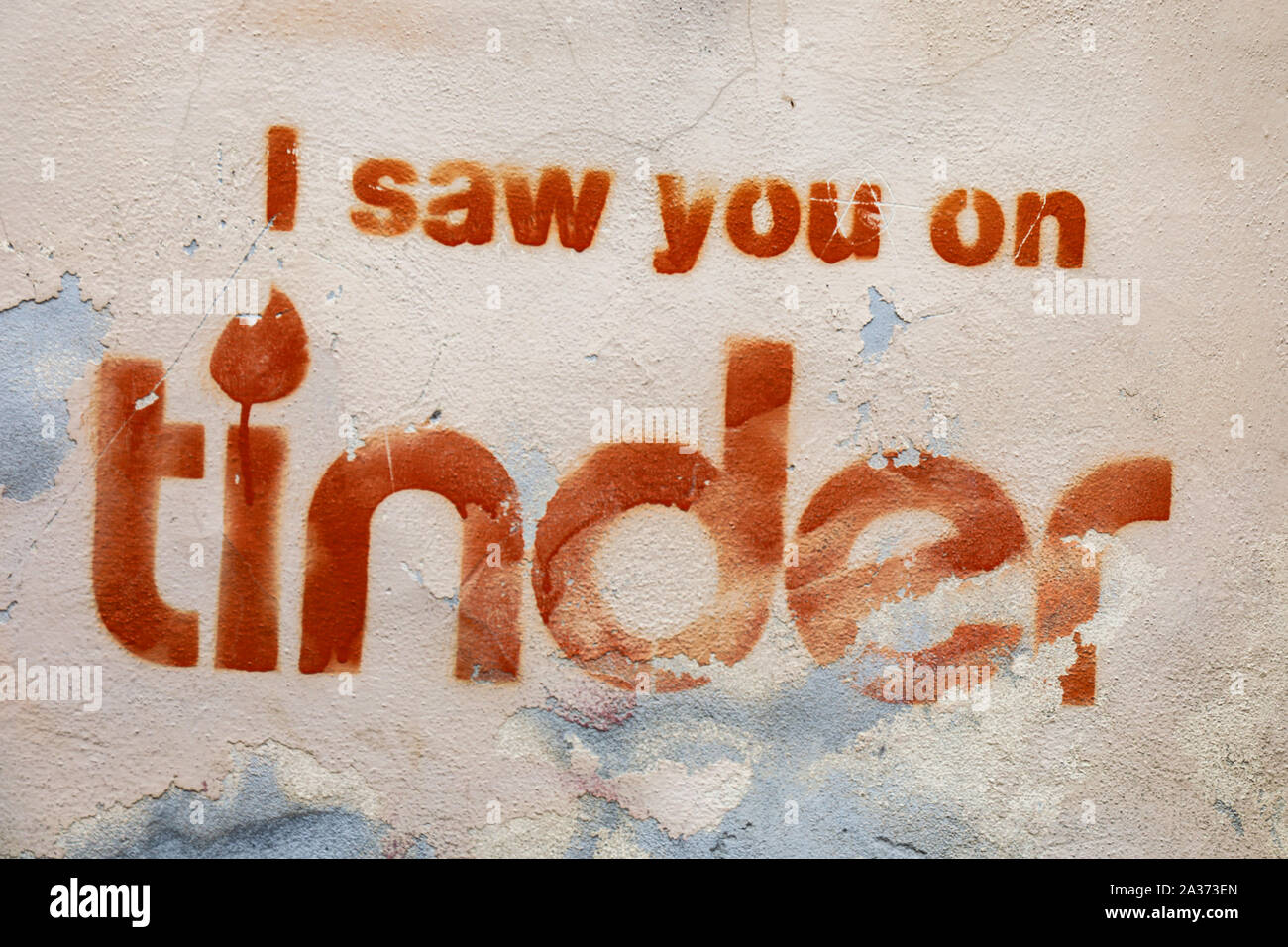 I saw you on tinder - stencil art in Trastevere district of Rome, Italy Stock Photo