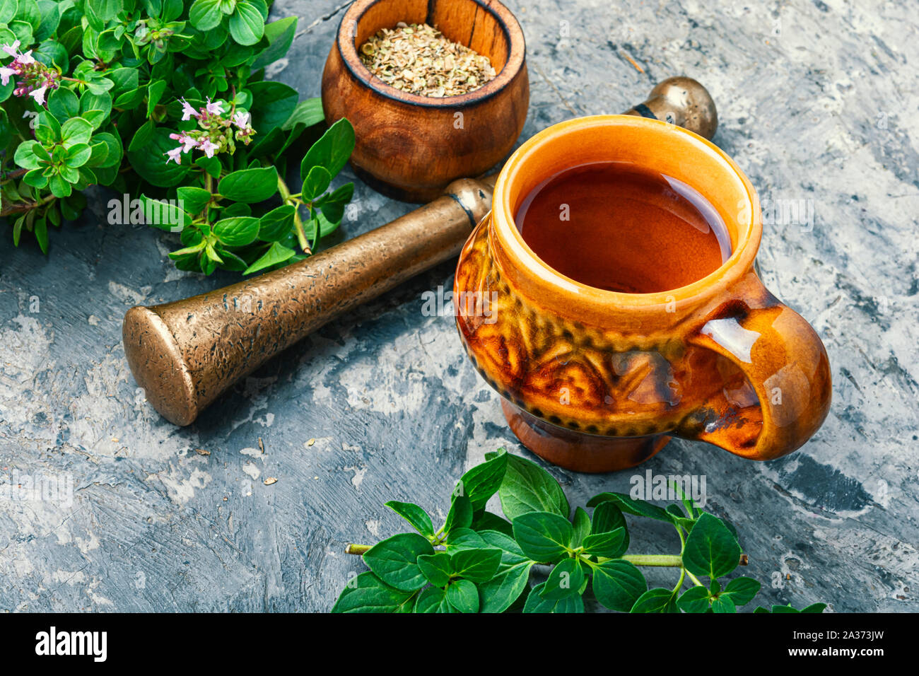 Medicinal tea from marjoram leaves.Herbal tea with oregano Stock Photo ...
