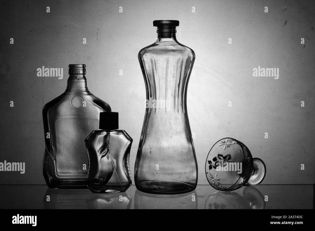 Transparent glass product shoot with white background at studio using back  light black & white Stock Photo - Alamy