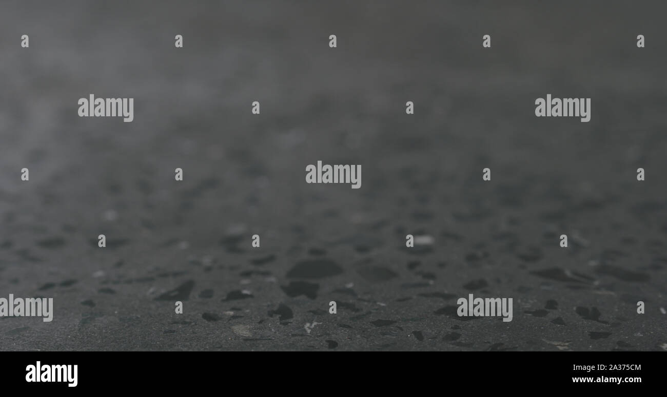 Closeup gray concrete terrazzo countertop, wide photo Stock Photo