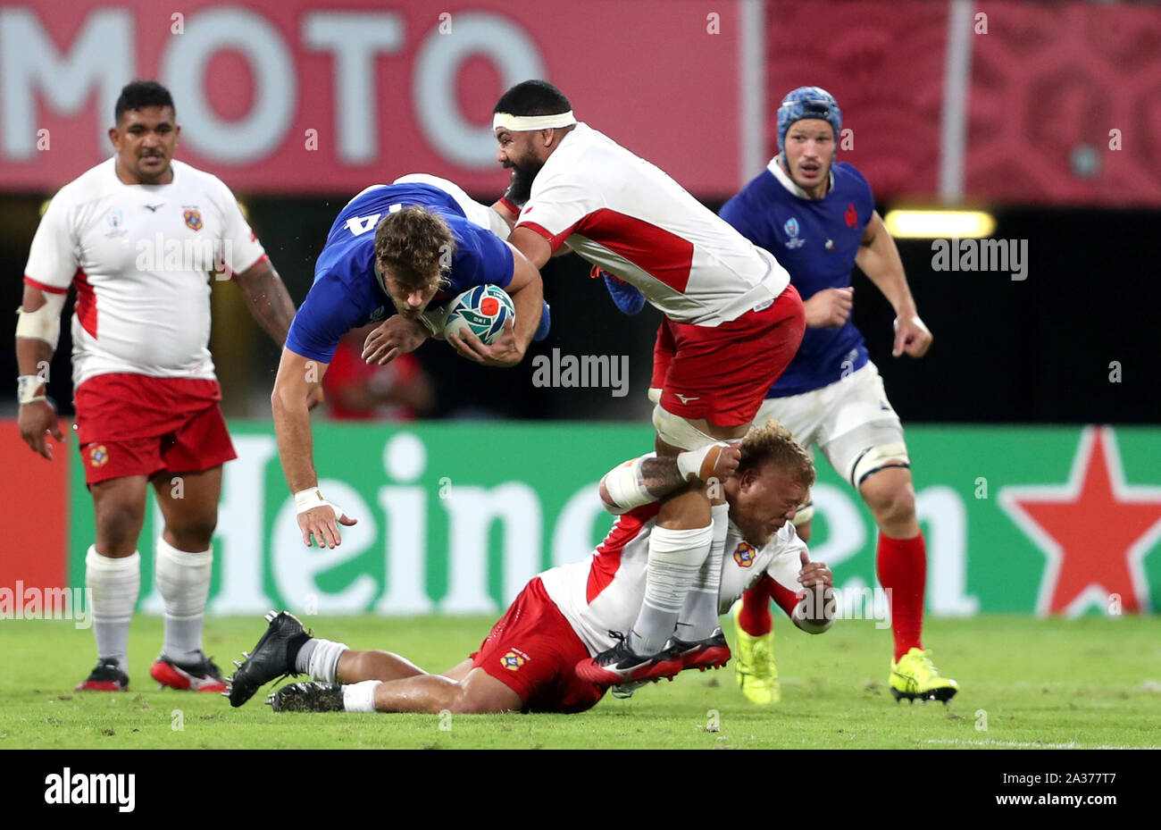 France's Damian Penaud is tackled by Tonga's Maama Vaipulu during the 2019  Rugby World Cup Pool C match at Kumamoto Stadium Stock Photo - Alamy