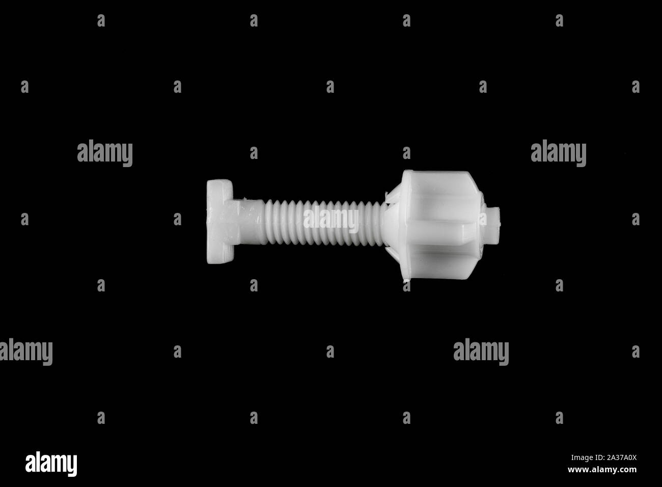 plastic toilet screw on black isolated background Stock Photo Alamy