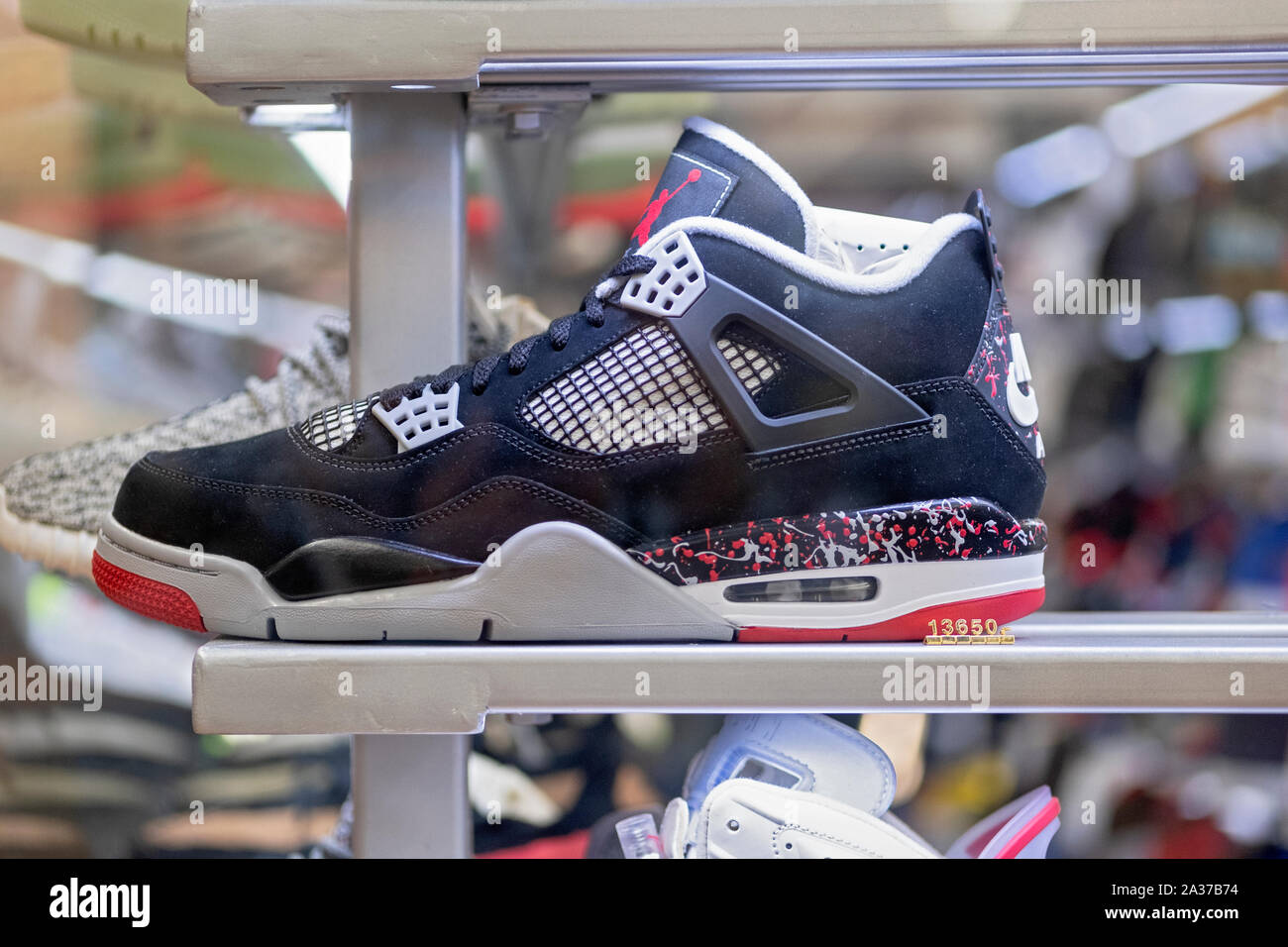 A rare expensive AIR JORDAN 4 shoe which debuted in 1989, for sale for  $13,850 at Flight Club on Broadway in Greenwich Village Stock Photo - Alamy