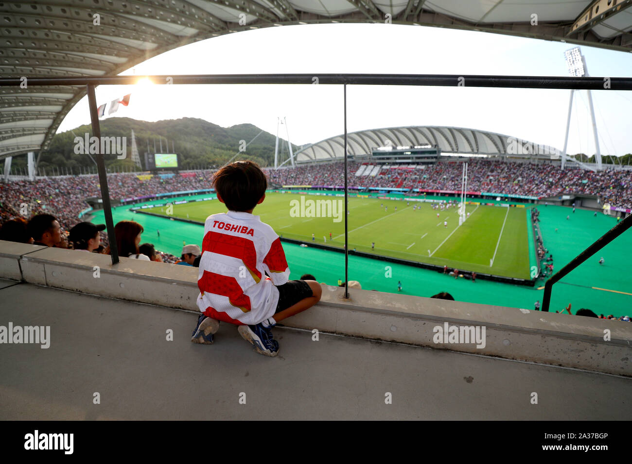 A young fans watches the action during the 2019 Rugby World Cup Pool C match at Kumamoto Stadium. Stock Photo