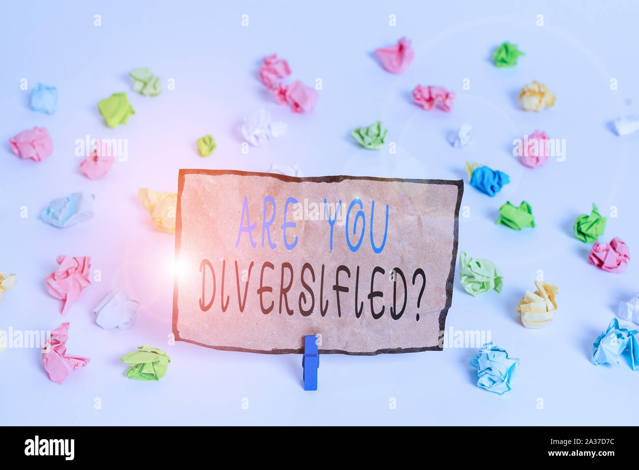 Text sign showing Are You Diversified Question. Business photo text someone who is Different Mixed Multi Faceted Colored crumpled papers empty reminde Stock Photo