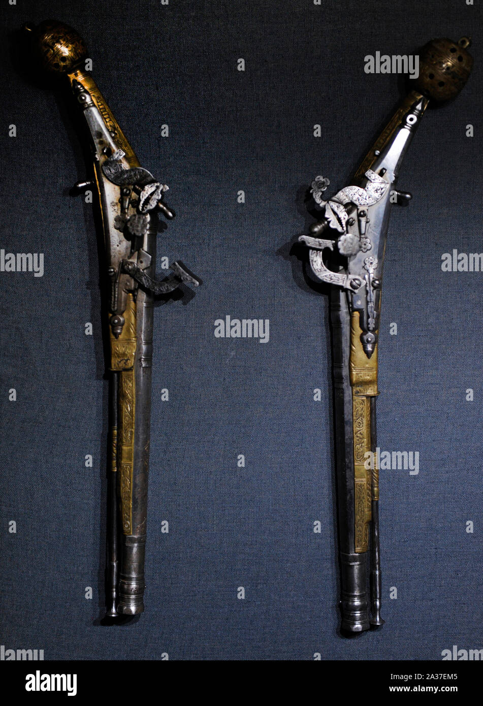 17th-18th century. Scotch pistols. Pair of Snaphance-locks pistols. Scotland, signed, 'Robert Allison Dundee', 1635. Wrought iron, engraved, brass, openwork. Unrifled, calibre: 13mm. From the former collection of the Moszynski family. National Museum of Krakow. Poland. Stock Photo