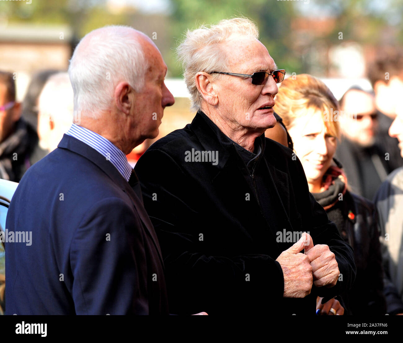 File photo dated 05/11/14 of Peter "Ginger" Baker (right) arriving for the funeral of Jack Bruce at Golders Green Crematorium in London, as his daughter has confirmed the rock drummer and co-founder of Cream has passed away peacefully at the age of 80. Stock Photo