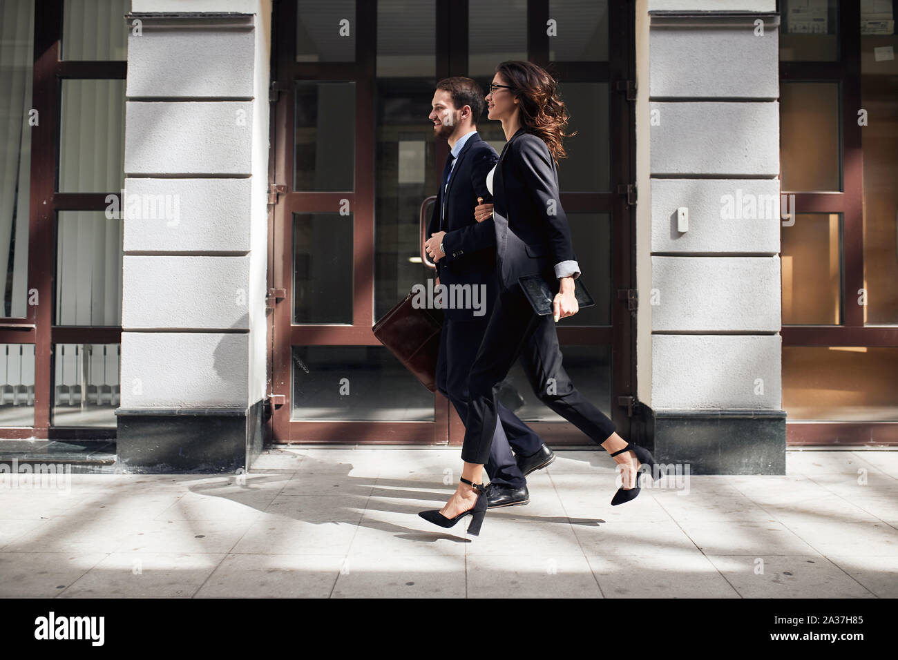 Business People Walking Side View