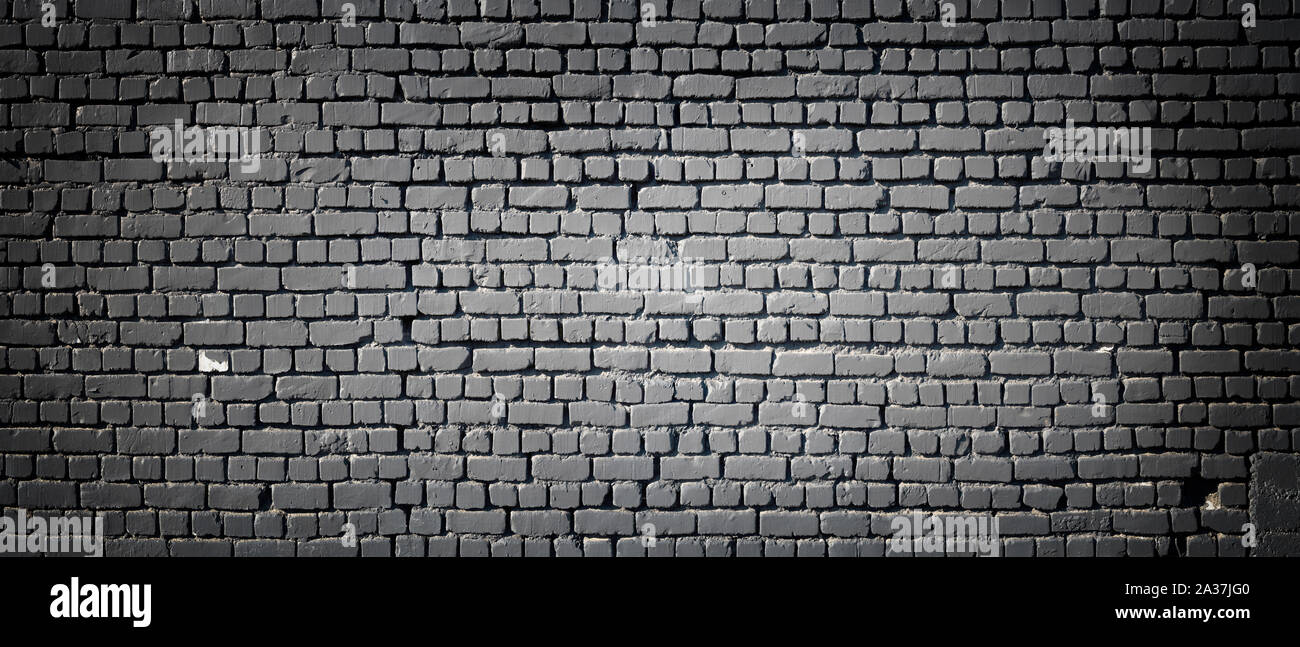 Black wall as background, texture of a black brick wall Stock Photo