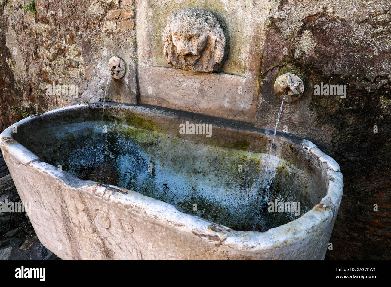 Fontana di via di Porta di San Pancrazio - a nasone offering free drinking water - in Trastevere district, Rome, Italy Stock Photo