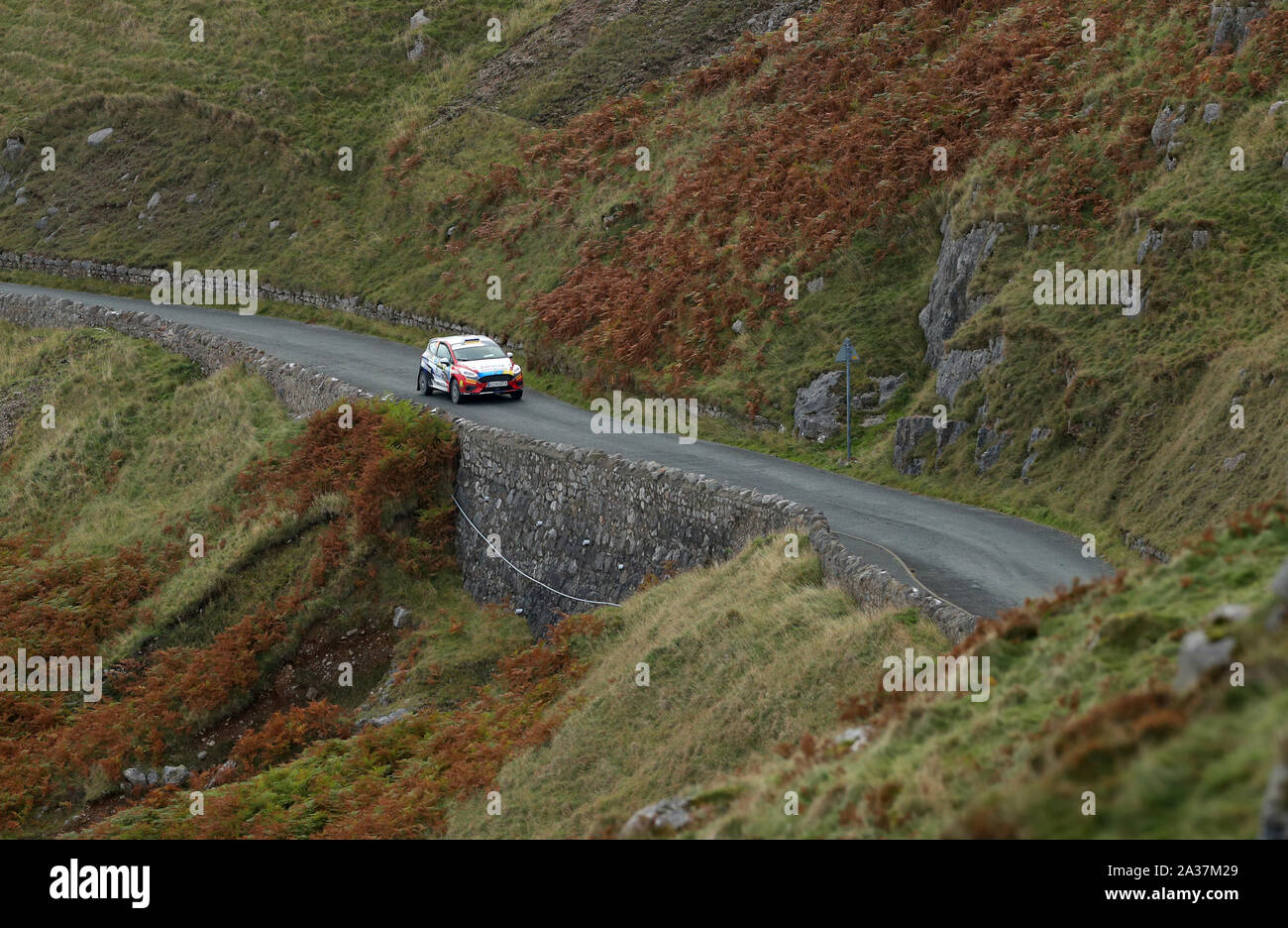 Paraguay's Fabrizio Zaldivar and Argentina's Fernando Mussano in a Ford Fiesta R2 during day four of the Wales Rally GB. Stock Photo