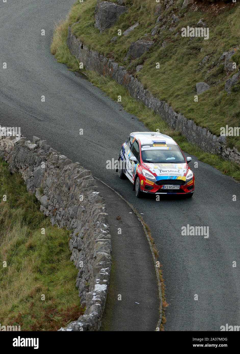 Fabrizio Zaldivar and Fernando Mussano in a Ford Fiesta R2 during day four of the Wales Rally GB. Stock Photo