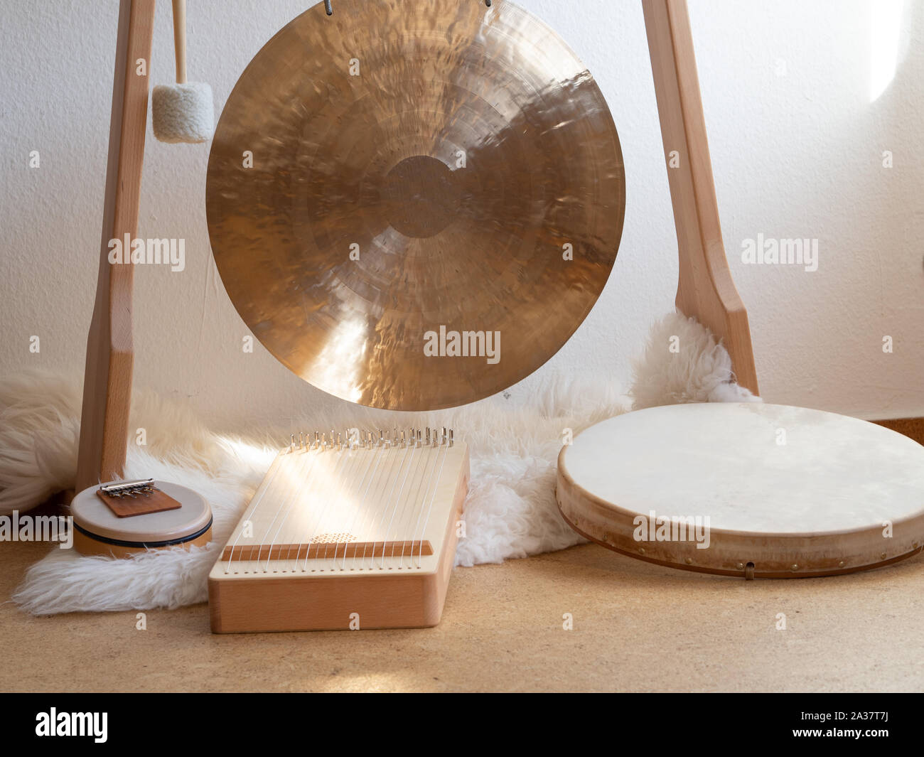 Sound healing therapy set up with gong, sansula, shamanic drum and