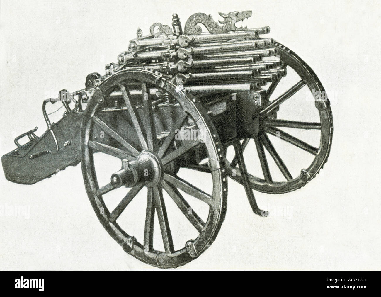 This image shows  an organ-gun, also known as a volley gun, that dates to 1600-1610. It has 20 iron gun barrels on five different levels. Stock Photo