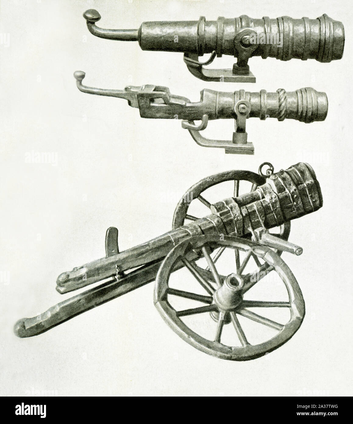 Pictured here are three medieval military weapons, all early cannon. The gun at top measures about 43 inches in length and dates to 1450-1500. The middle also measures abiut 43 inches in length and dates to 1480 to 1500 and could be used on a ship. The bottom cannon shot stones. It dates to 1450-1476. It measures about 32 inches in length. Stock Photo