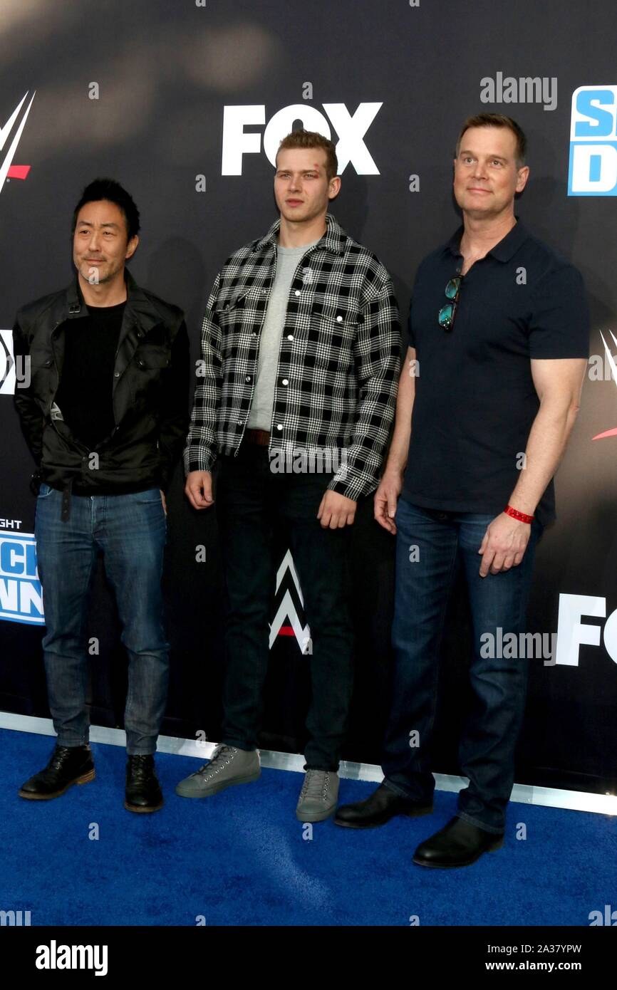 Ken Choi, Oliver Stark, Peter Krause at arrivals for WWE 20th Anniversary Celebration SmackDown Premiere, STAPLES Center, Los Angeles, CA October 4, 2019. Photo By: Priscilla Grant/Everett Collection Stock Photo