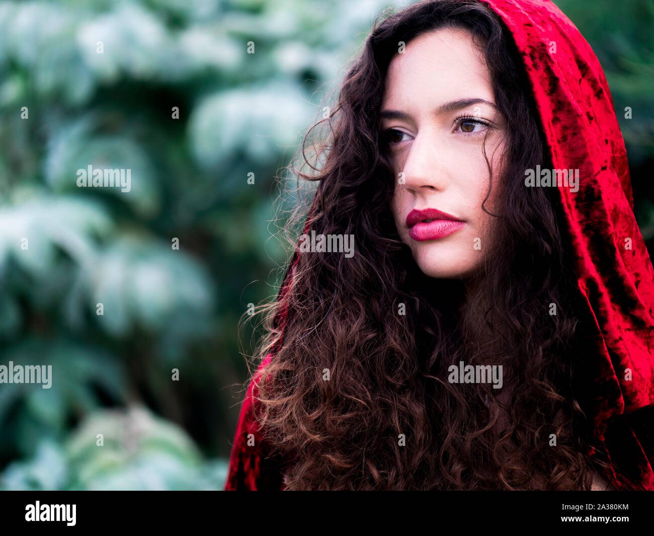 Beautiful young woman wearing red hoodie Stock Photo