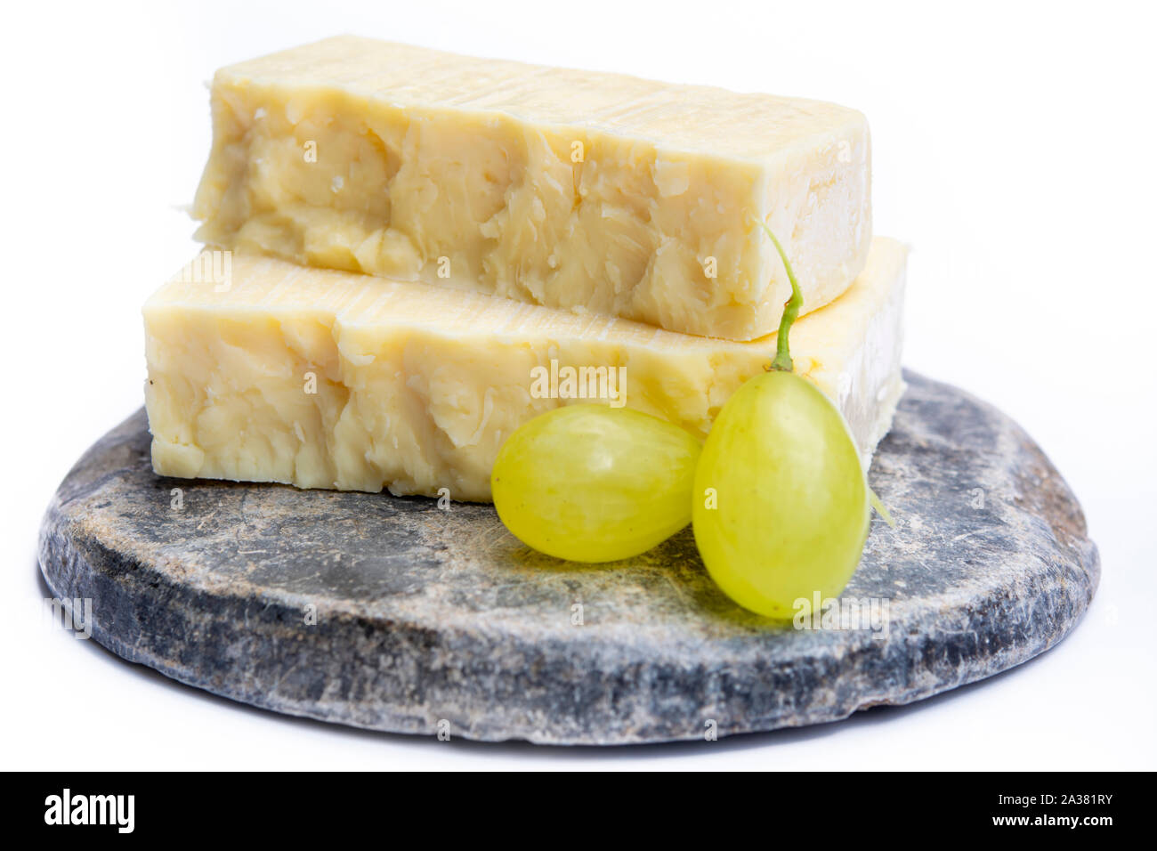 Cheddar cheese collection, block of Cheddar cheese made from cow milk
