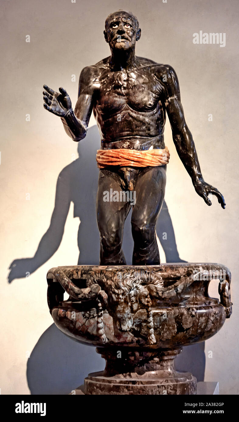Old fisherman, known as dying Seneca 2nd century AD Rome, Roman, Italy, (Black marble and alabaster, violet basin H. 183 cm.) Stock Photo
