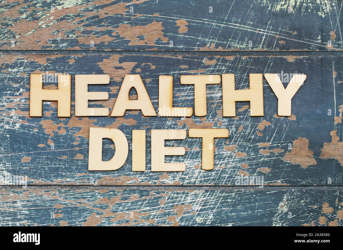 Healthy diet written with wooden letters on rustic wooden surface Stock Photo