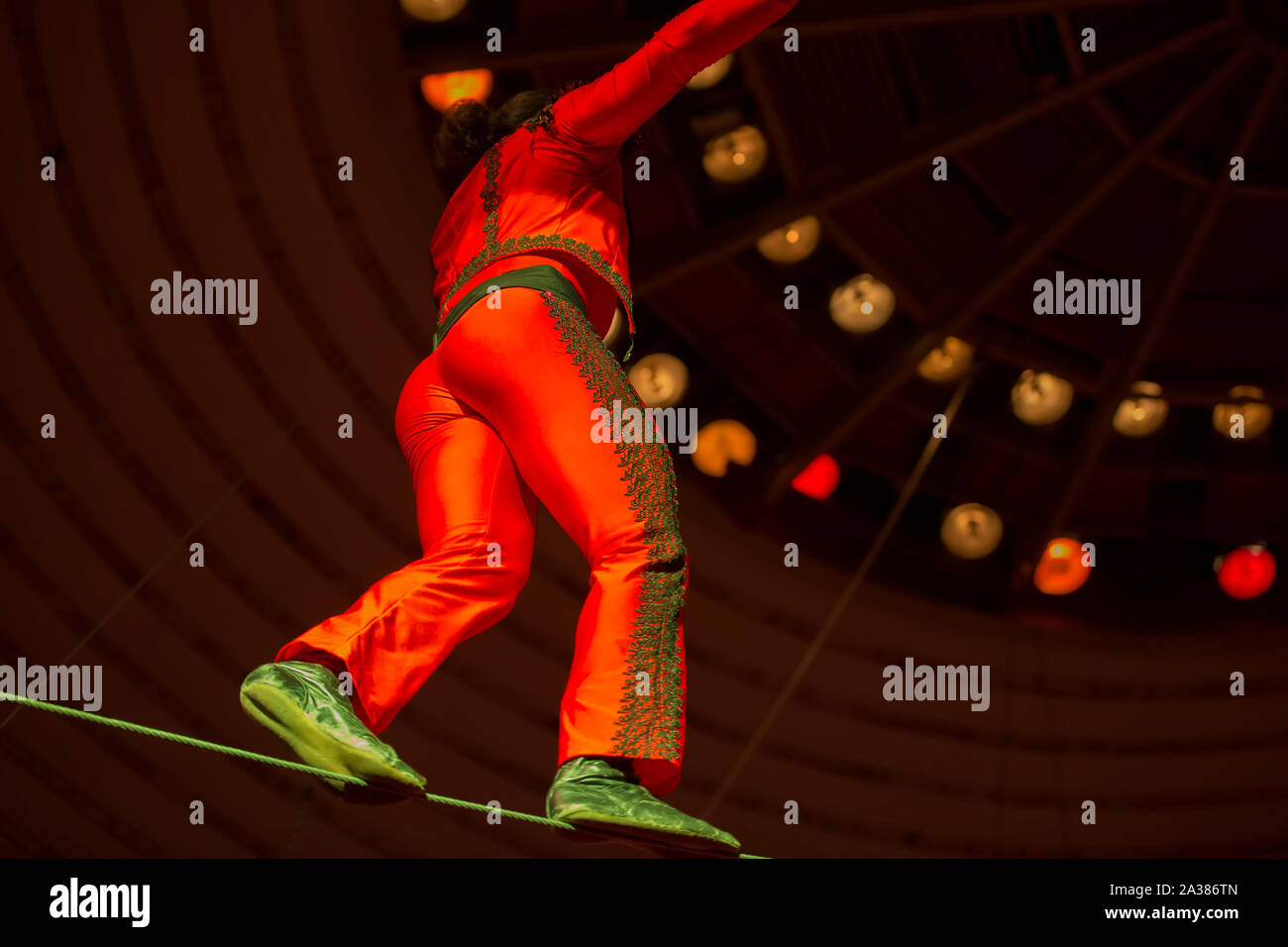 Belarus, Gomil, February 16, 2019. State Circus. Program Bravo Bravissimo.A tightrope walker walks along the wire under a circus dome Stock Photo
